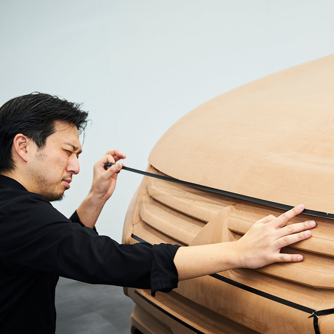 Man workimg on l200 model